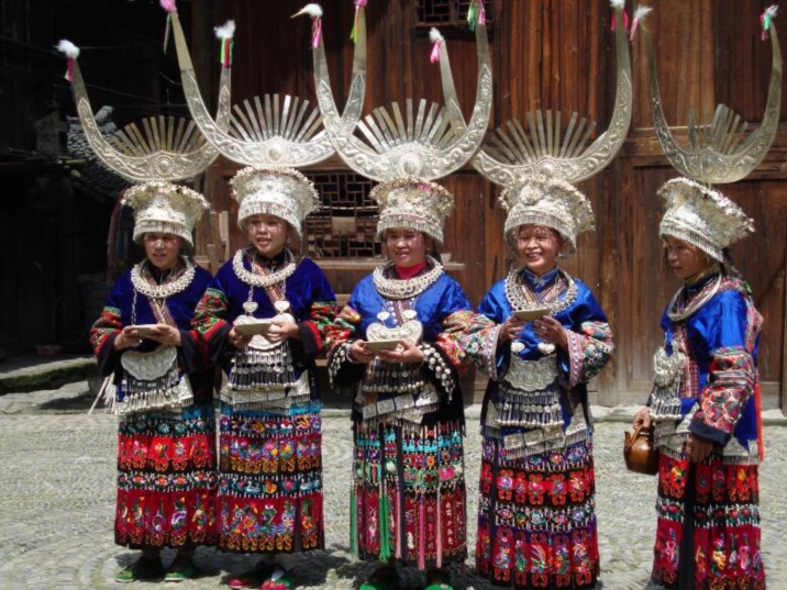 The unmarried young people in China's Miao community dance under the moon to seek their soulmate.